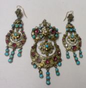 An interesting (probably Indian) metal and gem-set Crescent Brooch with drop; together with a pair