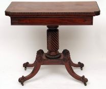 A Regency period Mahogany Scrolled Top Card Table with beaded edge over a plain moulded frieze,