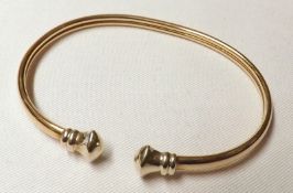 A modern hallmarked 9ct Gold Torc Design Bangle, weighing approximately 8 gm