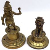 Two Vintage Brass Counter Cigarette Lighters, one modelled as Mr Punch and the other as a seated