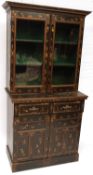 A late 19th Century Lacquered and Japanned Bookcase, the moulded cornice over two glazed doors