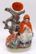 A 19th Century Staffordshire Figure Spill Vase, modelled as Little Red Riding Hood, decorated