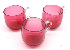 A Group of nine Cranberry Glass and clear-handled Custard Cups (some have chips/cracks), largest