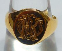 An early 20th Century hallmarked 18ct Gold Signet Ring, bearing a monogram and hallmarked for