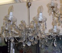 A 20th Century six branch Chandelier with glass prismatic drapes, 20” wide