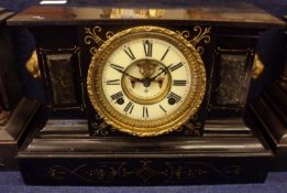 An early 20th Century Black Painted and Gilt Highlighted Metal Cased American Mantel Clock,