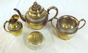 An early 20th Century Three Piece Tea Service with ribbed decoration, and a further Dressing Table