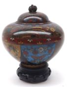 An early 20th Century Cloisonné Covered Jar of globular baluster form, the lift-off cover with plain