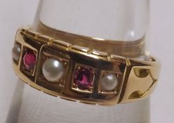 An early 20th Century hallmarked 15ct Gold two small Red Stone and three Pearl Ring, channel set (