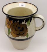 A Wilkinsons Honey Glaze large Wash Jug, decorated with coloured floral sprays and black detail on a