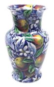 A Royal Cauldon wide-necked Baluster Vase, decorated with apples on a blue background