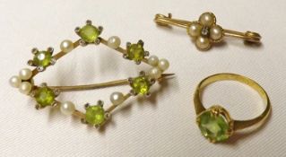 A Mixed Lot comprising: an Edwardian yellow metal framed lozenge-shaped openwork Brooch set with