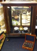 A set of 20th Century Mahogany Cased Beam Scales, together with a small case of various weights,