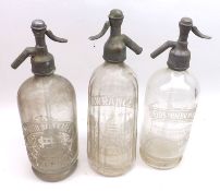 Three Clear Glass Soda Syphons, Field, Lawrences and Yarmouth Beverage Co, fitted with corroded