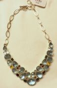 A white metal Topaz and Citrine etc Multi Gem Set Necklet, in Modernist style, stamped “.925”