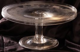 An early 19th Century Glass Tazza of circular form, with a slightly raised rim and moulded