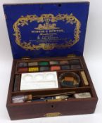 A Vintage Winsor & Newton Artist’s Box containing various paint blocks, small ceramic tray,