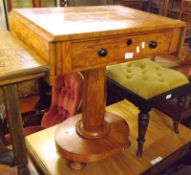 A 19th Century Satinwood Pedestal Table of rectangular form, fitted at either end with a drop flap