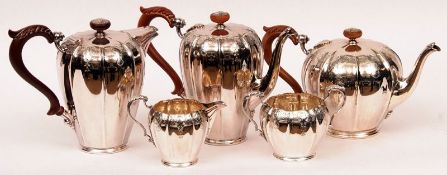 A Queen Elizabeth II heavy gauge Five Piece Tea/Coffee Service, decorated with ribbed and chased