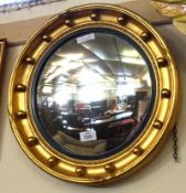 A Regency style gilt and gesso framed Circular Ball Moulded Convex Wall Mirror, 16 ½” diameter