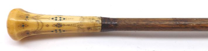 A 19th Century Bone Handled and Hardwood Walking Cane, the handle with gilded spotted neo-