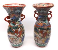 Two Kutani two-handled Baluster Vases, each with animalistic pierced handles and the bodies well