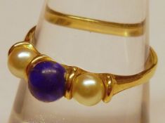 A hallmarked 9ct Gold centre Lapis Lazuli and two Pearl Ring