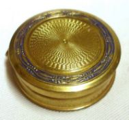 A Small Miniature Gilt Metal Powder Compact, fitted with hinged lid, mirrored interior marked “