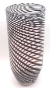 A large Czechoslovakian Tapering Art Glass Vase, with swirl design, the base with large ground