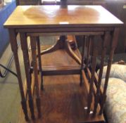 An Edwardian Graduated Set of three Mahogany Nesting Tables, the largest 20” high