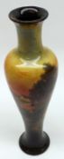 A Doulton Burslem Holbein Stem Vase of slip proportions, decorated with a rural scene at sunset,