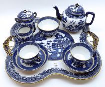 A 19th Century Cabaret Set, decorated in blue and white with a Willow pattern design, comprising a