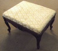 A Walnut Rectangular Footstool, beige upholstered pattered drop-in seat, the frieze and shoulders