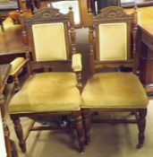A set of eight late Victorian Oak Dining Chairs (two Carvers), shell carved backs with turned side