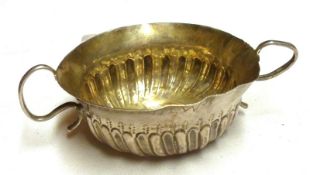 A Queen Anne Miniature Porringer of typical double handled form, Makers Mark John Cory, London 1703,