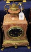 A Decorative Pink Veined Marble Cased Mantel Clock, crested with gilt metal finial over a circular