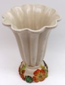 A Clarice Cliff “My Garden” flared wide lipped Vase of ribbed form, raised on a coloured floral