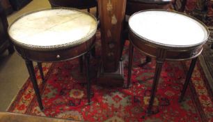 A near pair of Italian Circular Tables, each with marble insets and gilt metal pierced surrounds,