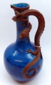 A 19th Century Burmantofts style Ewer, the handle formed as a brown serpent on a blue scaled