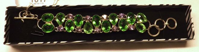 A heavy white metal Peridot and Amethyst set Modernist Design Bracelet, stamped “925”