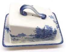 A Royal Doulton Norfolk Wedge-shaped Cheese Dish, typically decorated in blue with rural scene, 7”