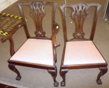 A set of seven Chippendale style Mahogany Dining Chairs, all with pierced interlace vase-shaped