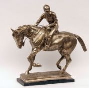 A large 20th Century Plated Model of Horse and Jockey, raised on a rectangular marble base, 22” wide