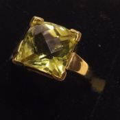 A hallmarked 9ct Gold Dress Ring, set with a large single Lemon Citrine of approximately 4.6ct