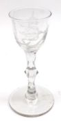 An 18th Century European Wine Glass, the bowl probably later etched with game bird and foliage on