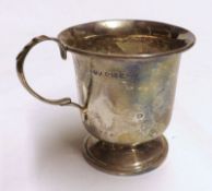 A George V single handled Christening Cup of typical form, raised on a round spreading foot,