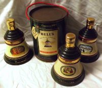 Four Christmas Bells Wade Decanters including one in canister: Christmas 1988, Christmas 1989,