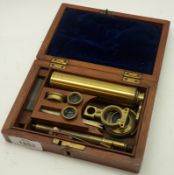 A late 19th/early 20th Century Mahogany Cased Field Microscope, unsigned, the hinged mahogany case