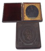 A Bakelite Cased Tinted Photograph depicting a mother and child; and a further Daguerreotype