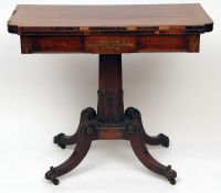 A Regency period Rosewood crossbanded and brass strung Fold Top Card Table, the frieze with a cut